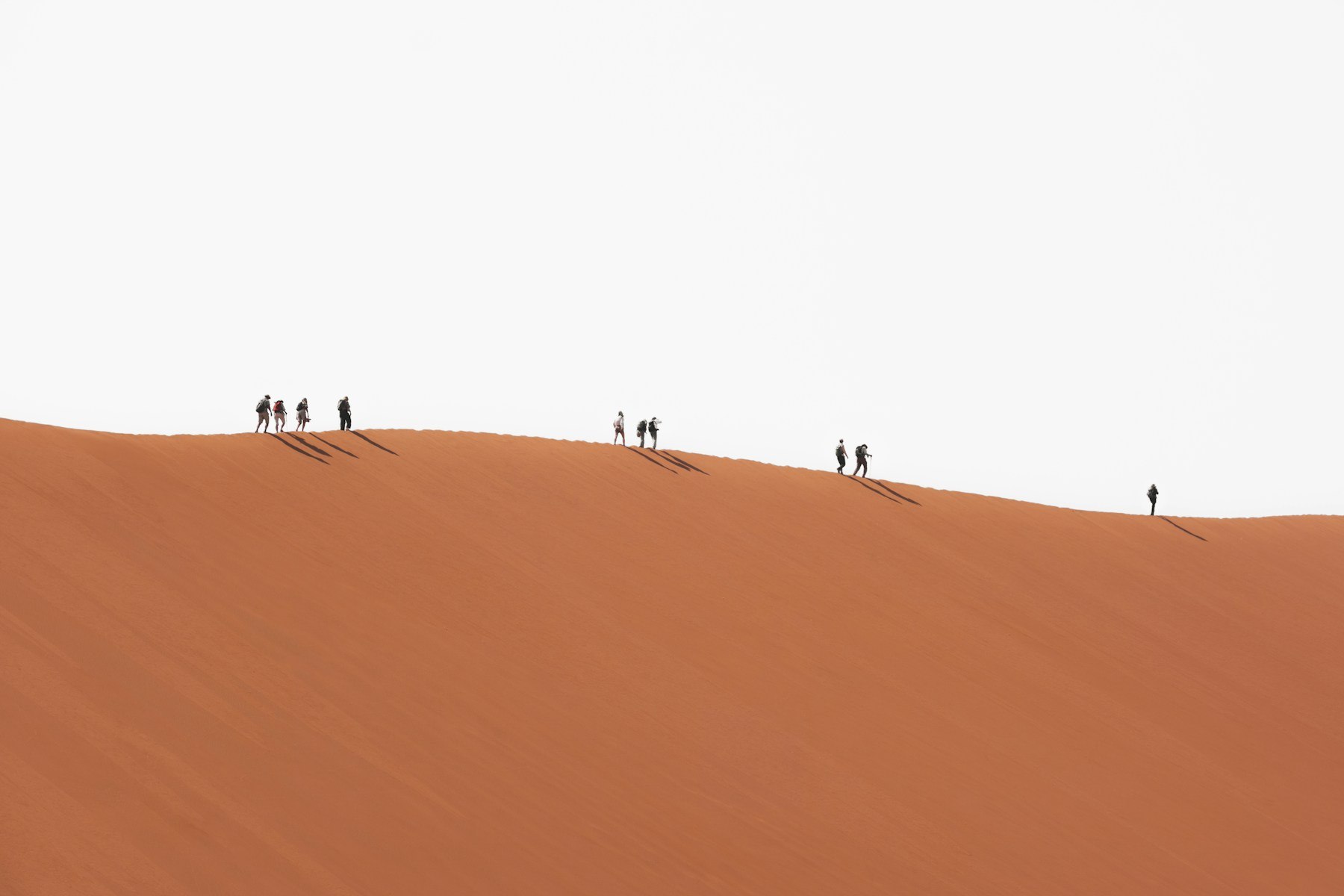 Hikers on Big Daddy dune, Sossusvlei, Namibia