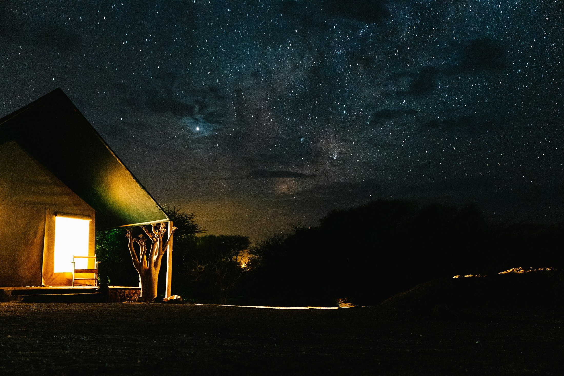 A camp beneath the Namibian night sky